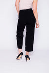 A pair of women's black high-waist ankle trousers displayed on a plain background, featuring a tailored design with a flattering high-rise waist and ankle-length cut.