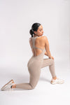 beige Backless workout jumpsuit for women, ideal for yoga and gym sessions