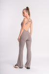 Backless yoga jumpsuit with flared pants for flexibility and comfort during CrossFit