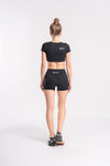 Chic black activewear set for women with high waist shorts and crop top