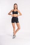 Moisture-wicking women’s sports bra and matching gym shorts