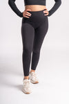 black seamless yoga pants and long-sleeve crop top set, breathable and sweat-wicking