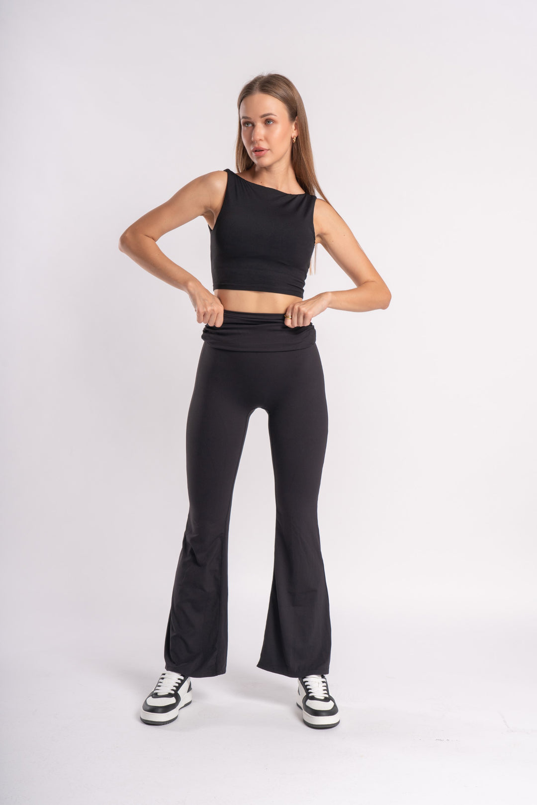 Yoga-ready set with a sleeveless crop top and high-waist flare pants