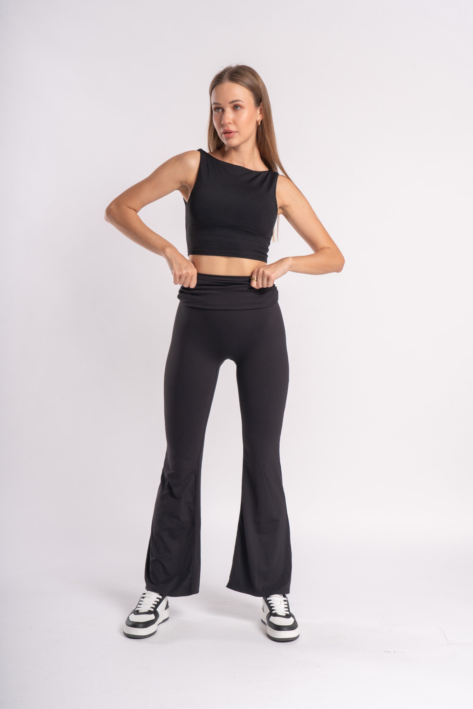 Yoga-ready set with a sleeveless crop top and high-waist flare pants