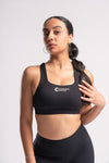 Athlete in a high-waisted yoga pants and compression sports bra set, designed for ultimate comfort