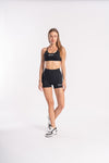 Stylish sports bra and shorts combo for women’s activewear.