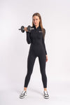 Women's workout jumpsuit with long sleeves and zip closure