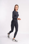 black fitted seamless yoga pants paired with cropped top for workout