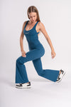 Women's full-body blue flared jumpsuit, backless for extra comfort during yoga and CrossFit