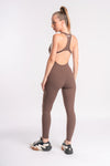 Women's brown backless activewear jumpsuit, great for yoga and gym routines