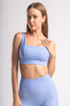 Three-piece workout outfit - high-waisted yoga pants, sports bra, and jacket