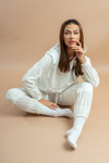 Comfy white crop tracksuit with hood, perfect for women’s activewear and casual outings