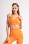 fashionable, comfortable and active wear orange color sports bra and yoga pants set