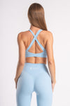 Women’s workout set - blue yoga pants and cross-back sports bra for ultimate comfort