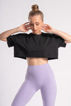 oversized crop top black color paired with lavender pants