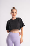 women wearing black color oversized crop top for casual look