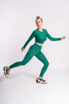 Stretchy green leggings made from a flexible fabric