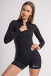 Black zip-front long sleeve unitard for women, featuring a short length for sporty look