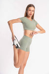 Slim-fit olive green crop top and high-rise shorts for women