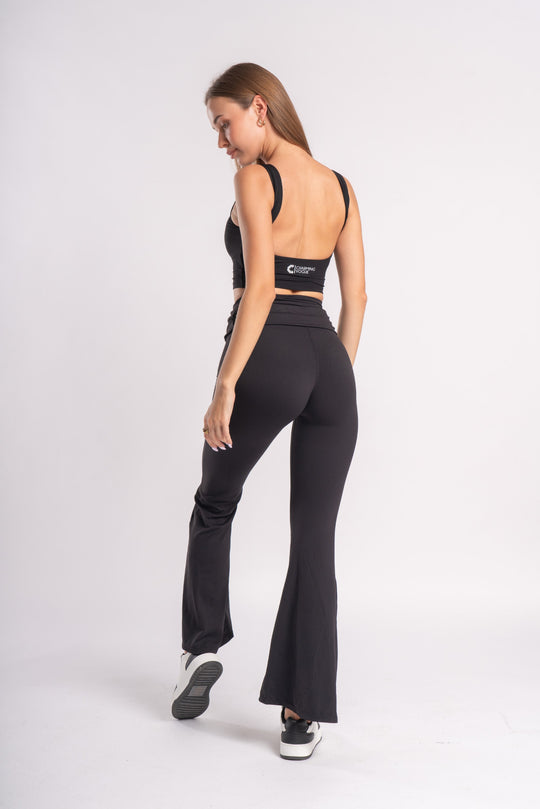 Elegant backless crop top and flare yoga pants perfect for yoga and leisure