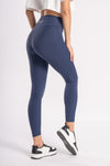 High-performance women's blue yoga pants, designed for flexibility