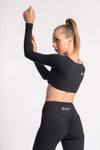 High-waist yoga pants with a stylish full-sleeve crop top for women’s workout wear