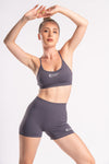 Comfortable sports bra with high-waisted shorts for women’s gym wear.