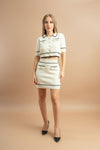 Elegant knitted tweed white co-ord set featuring a crop shirt and matching skirt