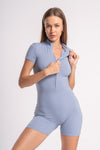 Front-zip short unitard for women, ideal for gym and workouts