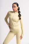 gym outfit set in lime yellow color with fitted zip jacket and thumb grips