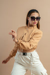 Women's warm beige winter coat with a cropped silhouette and long sleeves