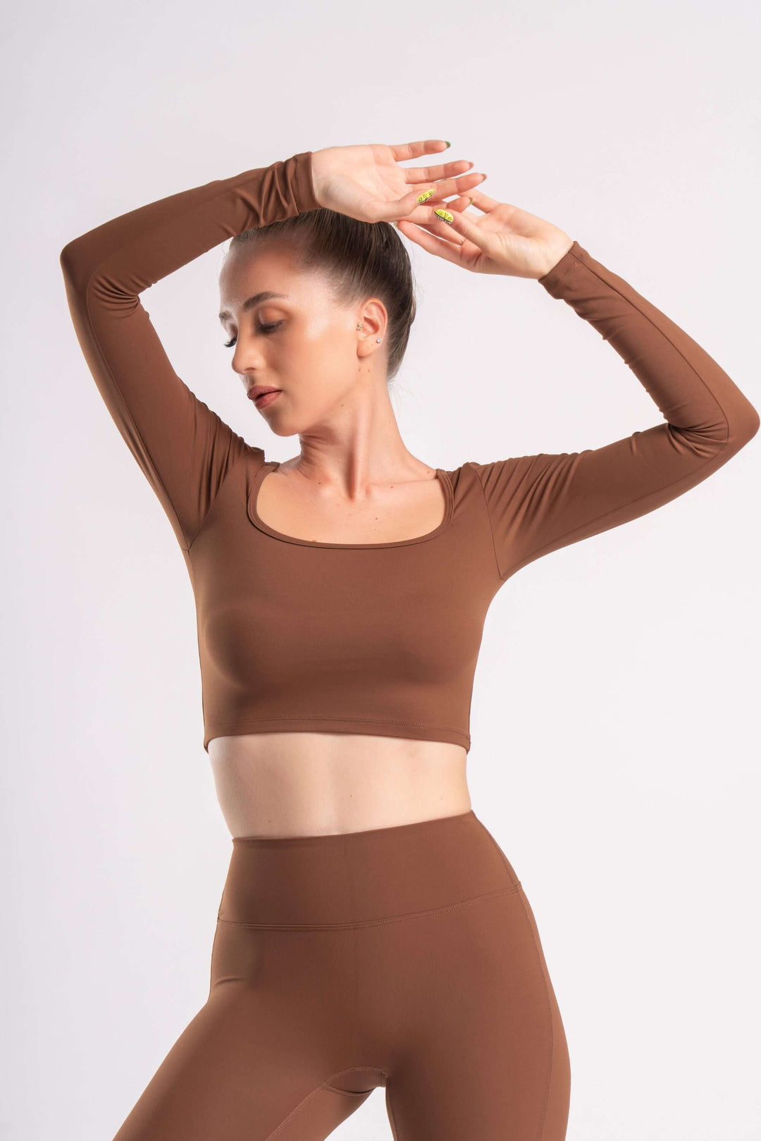 high-waist leggings and long-sleeve crop top for yoga, gym, and fitness