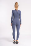 Body-hugging zip-front jumpsuit with long sleeves, perfect for gym workouts