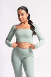 a set of grey color woman gym wear of top and bottom wear