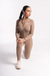 Long-sleeve bodycon jumpsuit with zip closure for women’s fitness