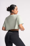 Olive green crop top styles with black pants and trousers from Charming Vogue