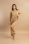 Knitted orange co-ord set with turtle neck and wide-leg trousers for women