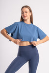 oversized crop top of blue color with short sleeves suitable for gym wear