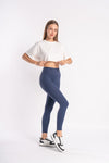 cropped tshirt styled with blue yoga pants for active wear and casual styling