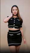 woman wearing black color knitted wool co-ord set of crop shirt and skirt