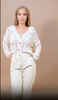 White knitted cardigan with long sleeves and button closure for a classic style