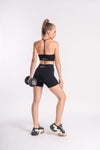 Ribbed halter neck bra and matching high-waist shorts for women’s fitness