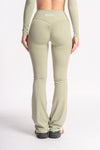 woman in sage green seamless high waist sports leggings