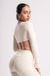 cream seamless high-waist leggings and matching cropped top for women