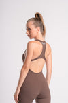 Seamless women’s brown backless jumpsuit, breathable fabric for yoga and workouts