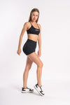 High-support sports bra and compression shorts for women