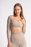 Seamless full-sleeve crop top and high-waist yoga pants for women’s gym wear