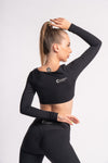 Stretchable full-sleeve crop top and high-waist yoga leggings for active women