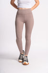 Taupe-colored women's yoga pants, high-waisted and perfect for flexibility