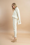 Women’s chic white sweater with sparkling rhinestone accents